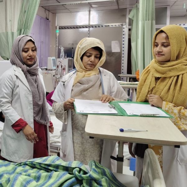Doctor Gulshan Chaudhury treating patients at Bangladesh Shishu Hospital Doctor Gulshan Chaudhury treating patients at Bangladesh Shishu Hospital
